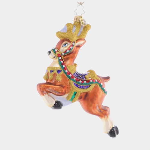 Video - Ornament Description - Take to the Skies: Magnificent and mounted with a holiday saddle, this leaping stag is ready to bring Christmas joy to your tree. This video shows the ornament spinning slowly. 