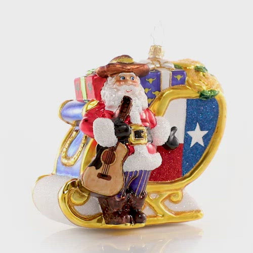 Video - Ornament Description - Santa's Lavish Lone Star Sleigh: Ho-Ho-Howdy partner! Santa shows off his new ride and a fresh new pair of boots. If he starts wearing spurs, we might need to start calling him Tinsel Tex! This video shows the ornament spinning slowly. 