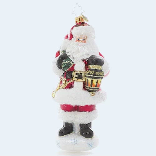 Video Ornament Description - A Trusted Guide: Nothing stops Santa Claus, especially on Christmas Eve! No matter the weather, the glow from his trusty lantern lights his way through the snow on even the bleakest winter nights.