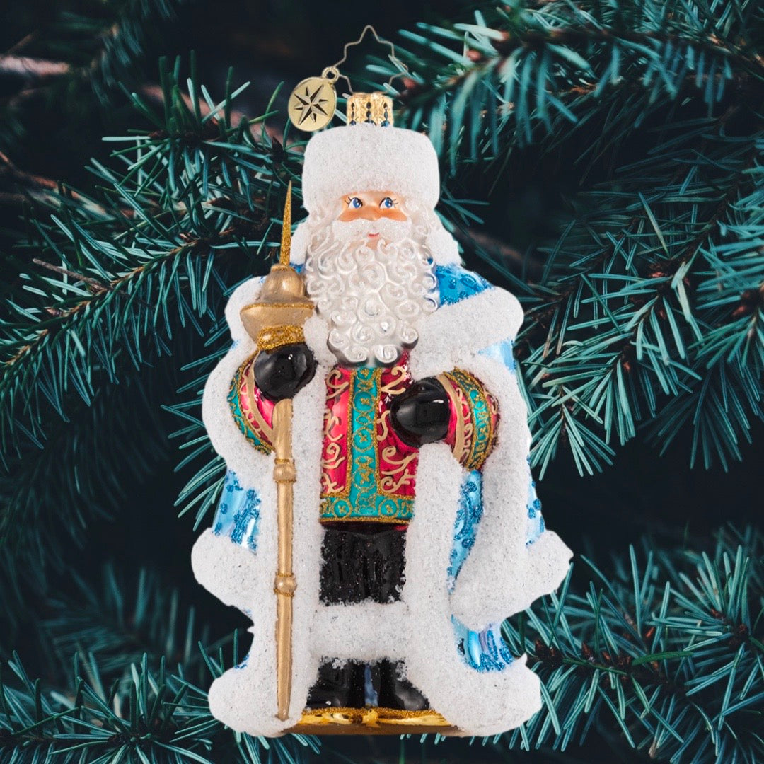 Ornament Description - Spiffy For the Soiree: He is truly the king of Christmas! Looking positively royal in ice-blue regalia, Santa awaits the arrival of his guests at his annual holiday jubilee.