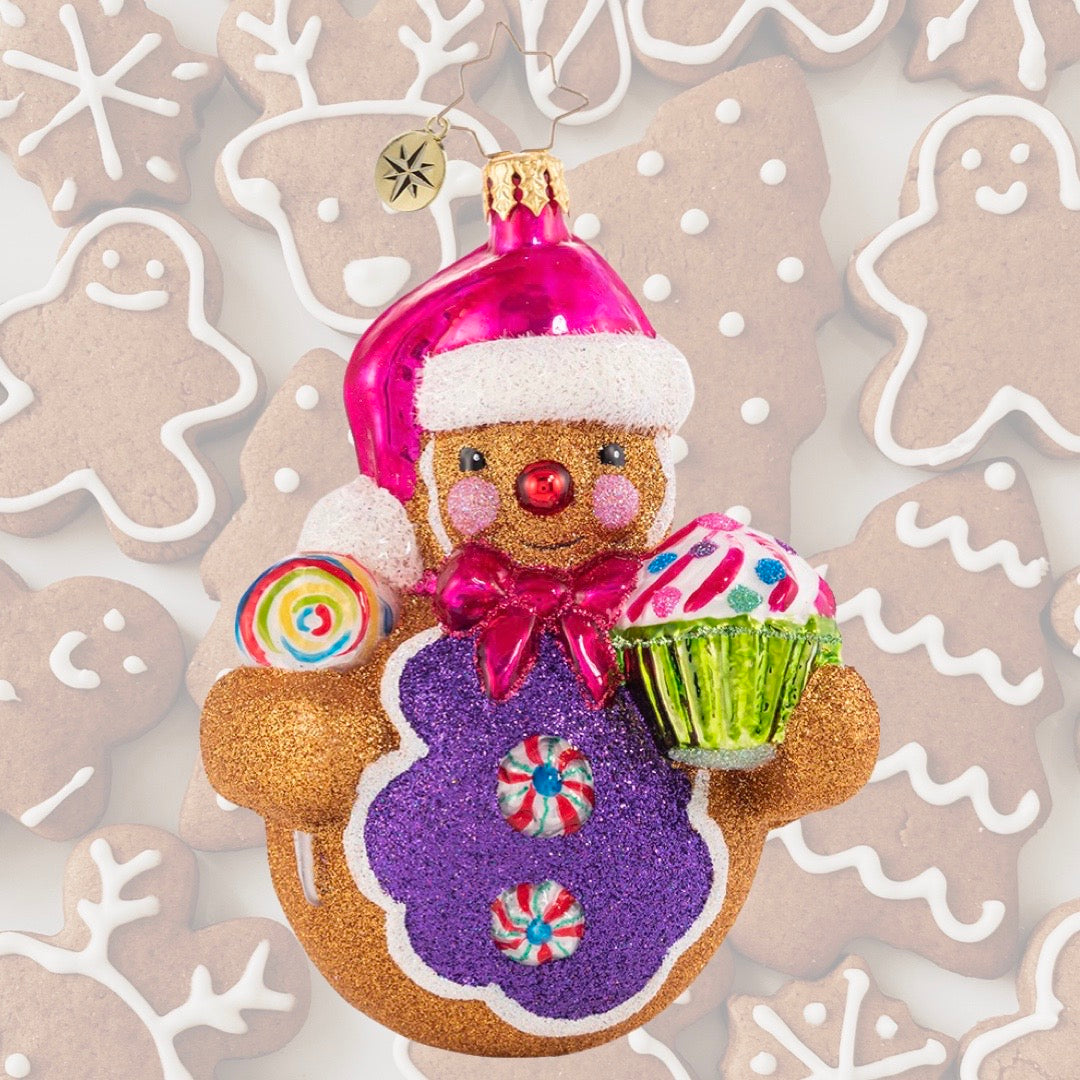 Ornament Description - Roly-Poly Treat Tester: Cupcakes and lollies and peppermints, oh my! This gingerbread man knows there is no such thing as too many sweets.