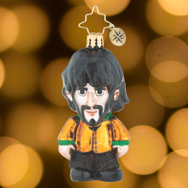 Ornament Description - King George: He's not moody, he's just intense. George Harrison was always the introspective one of the Fab Four. And he could really play the sitar!