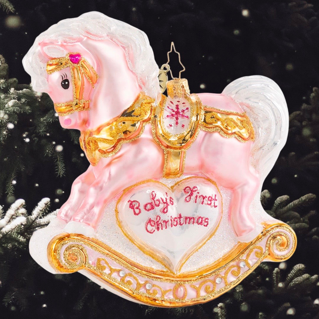 Ornament Description - Baby's First Christmas Filly: A gift more precious than rubies or pearls -- a sweet little beautiful baby girl! Commemorate your new arrival with this keepsake rocking horse in powder pink.