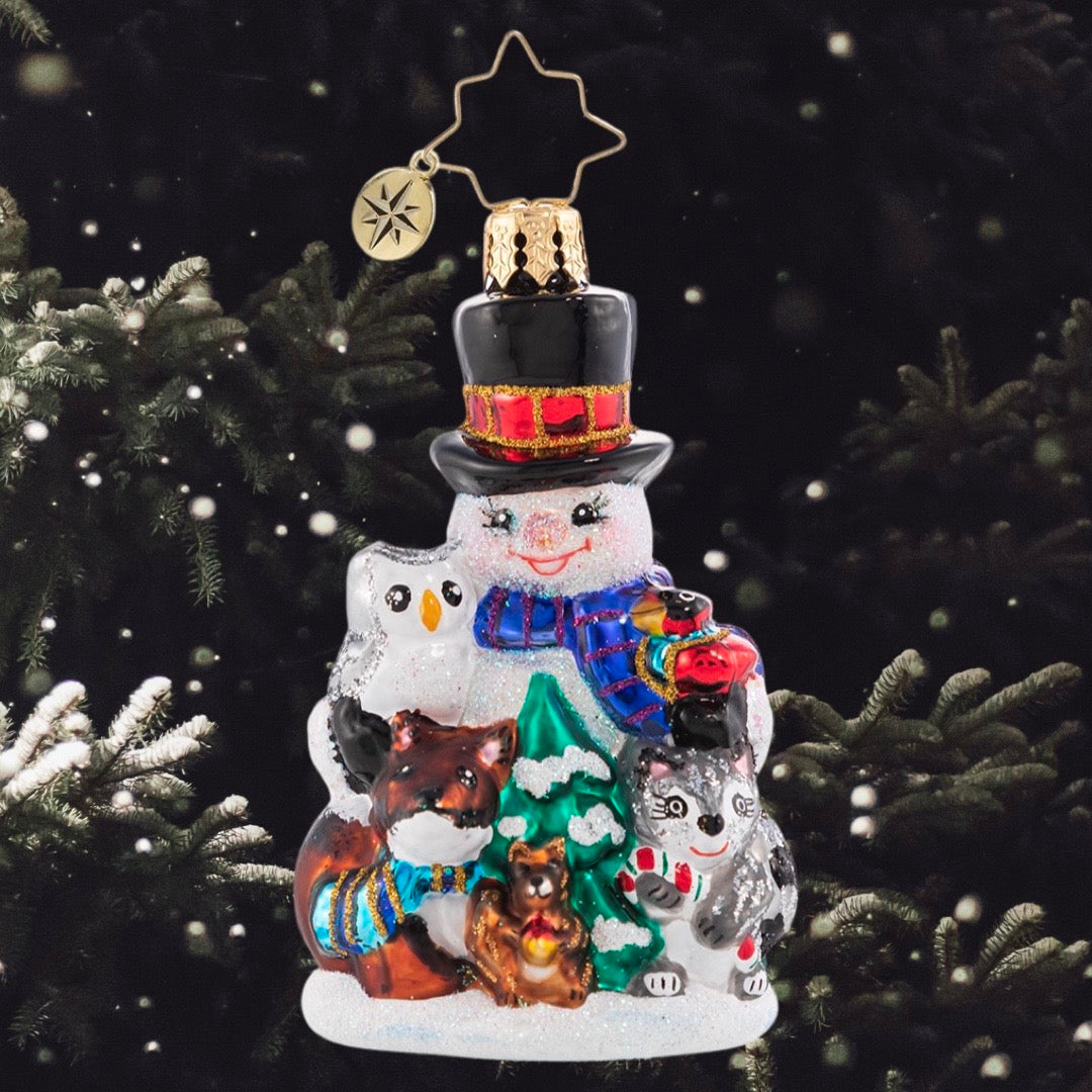 Ornament Description - Friends of the Forest Gem: This sweet little snowman knows better than anyone that time spent in a snowy forest is the dreamiest way to get close to nature. He and his woodland friends are snuggled up for the season!