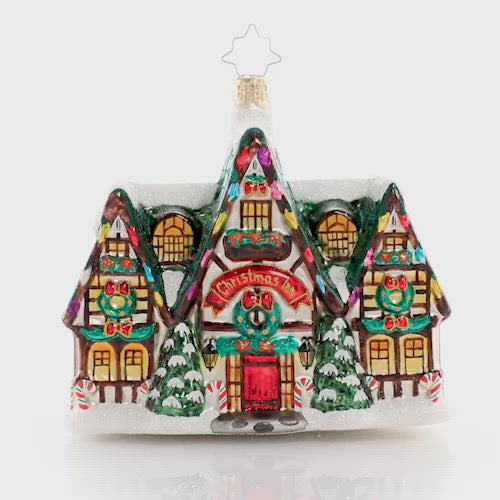 Video - Ornament Description - Happy Holiday Memories: It is Christmas time in the city and in this tiny town! The little shops are decorated for Christmas and are bursting with holiday cheer. Do not forget to shop small this holiday! This video shows the ornament slowly spinning. 