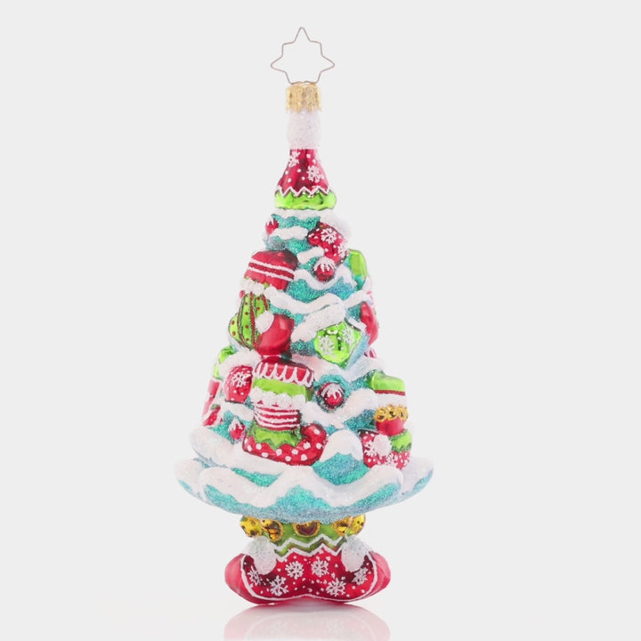 Video - Ornament Description - Santa's Helpers Tree: Tastefully trimmed in elfin stockings and boots, this cheerful Christmas tree is the perfect place to showcase Santa's gifts! Afterall, his helpers did build the toys… This video shows the ornament spinning slowly. 