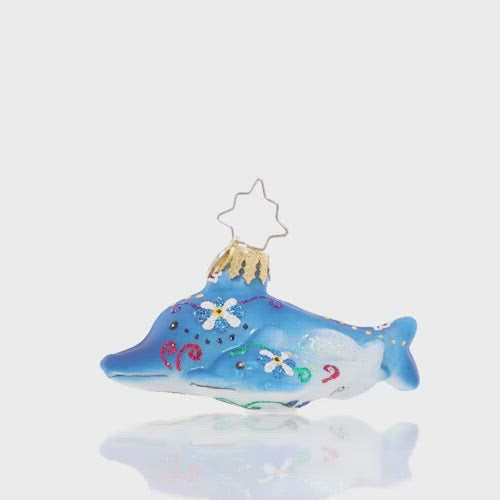 Video - Ornament Description - Swimming Through Florals Gem: It may be the middle of winter, but this friendly dolphin pair is sure to remind you of warmer days ahead! Gaze at their bright colors and tropical florals and reminisce about your favorite vacation memories! This video shows the ornament spinning slowly. 