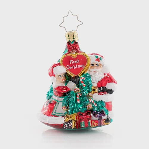 Video - Ornament Description - The First Of Many Christmases Gem: It is a match made in holiday heaven! Wishing these little lovebirds the world as they celebrate their first Christmas together. This video shows the ornament spinning slowly. 