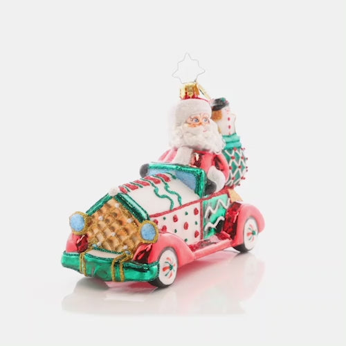 Video - Ornament Description - Sweet Ride: Hop in santa's sugar-powered cookie car, and take a sweet ride to Candy Cane Lane! This Christmas-mobile is a cloying and clever addition to any tree. This video shows the ornament spinning slowly. 