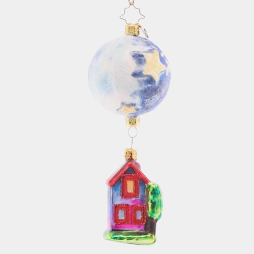 Video - Ornament Description - My Papa Moon: Embody the sweetness and warmth of the World of Eric Carle World this Christmas with Papa's Moon and remember what really matters most this time of year. The celestial moon hangs delicately over the charming cottage home, bringing to mind the innocence and nostalgia of childhood we all yearn for. This video shows the ornament spinning slowly. 