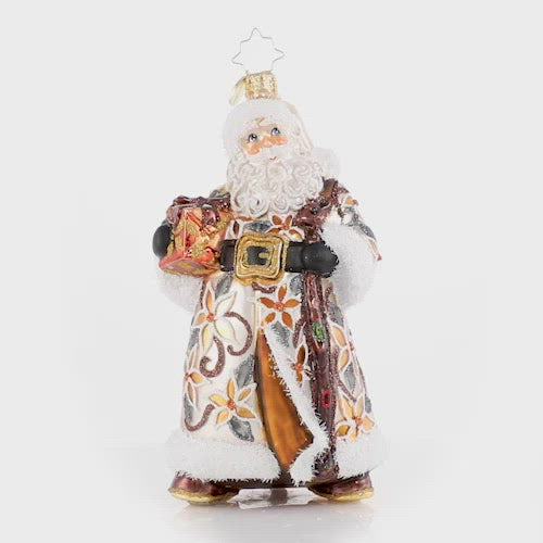 Video - Ornament Description - Bountiful Basket Traveler: Santa has emerged from a long trek through the forest, carrying a heavy woven basket full of gifts to share. Nothing will stand in the way of Santa delivering every last bit of Christmas cheer!