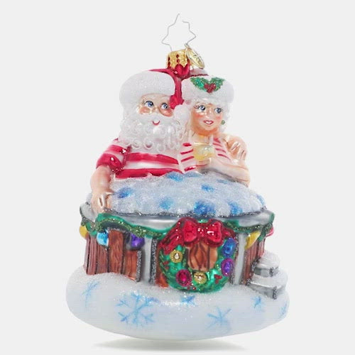 Video - Ornament Description - Holiday Hot Tub: There's nothing like a bubbling hot tub after a long day of baking and toy making! Mr. and Mrs. Claus take a well-deserved break to rest and relax. This video shows the ornament slowly spinning. 