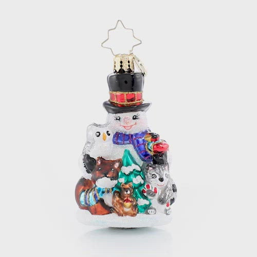 Video - Ornament Description - Friends of the Forest Gem: This sweet little snowman knows better than anyone that time spent in a snowy forest is the dreamiest way to get close to nature. He and his woodland friends are snuggled up for the season! This video shows the ornament slowly spinning. 