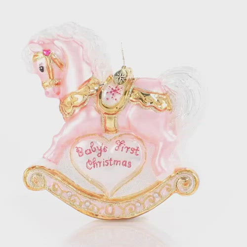 Video -  Ornament Description - Baby's First Christmas Filly: A gift more precious than rubies or pearls -- a sweet little beautiful baby girl! Commemorate your new arrival with this keepsake rocking horse in powder pink.