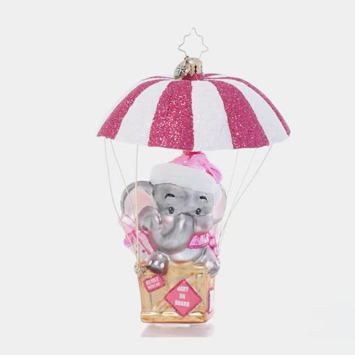 Video - Ornament Description - Sugar and Spice Baby: Special Delivery! Celebrate your new arrival with this darling ornament featuring an adorable baby elephant floating in on a shimmering pink and white air mail parachute. This video shows the ornament spinning slowly. 