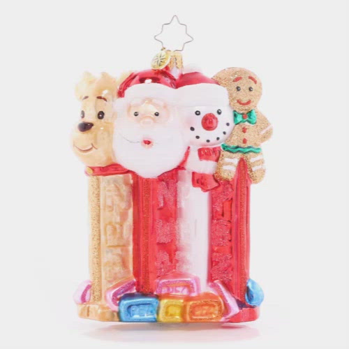 Video - Ornament Description - North Pole PEZ: Santa, his faithful reindeer, a jolly snowman, and a cheery gingerbread man join together in this charming piece that celebrates two of the things that help make the holiday season so sweet: good company, and delicious PEZ candies!