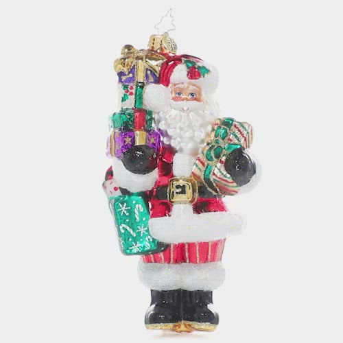 Video - Ornament Description - Front Santa With Love: Someone's been extra good this year! Santa has spared no expense, his arms laden and piled high with brightly wrapped parcels sure to delight! This video shows the ornament slowly spinning. 