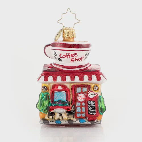 Video - Ornament Description - Wake Up And Smell The Coffee Gem: You know what they say-- a bad day with coffee is better than a good day without it! Rain or shine, this miniature coffee shop works hard to make sure everyone can get their fix! This video shows the ornament spinning slowly. 