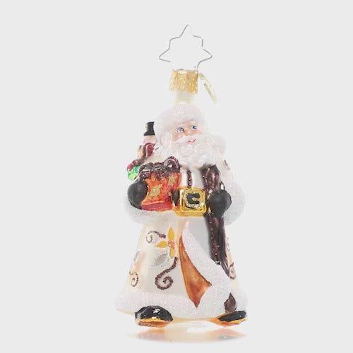 Video - Ornament Description - Bountiful Basket Traveler Gem: Dressed in wintry white and carrying a basket of sundries, Santa looks ready for a long trek. It's a snowy one out there, but luckily he's an expert North Pole navigator!