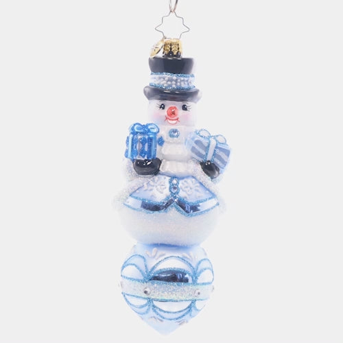 Video - Ornament Description - Frosty Snow Fellow: Looking extra frosty and fresh, this festive snow-fella is perched upon a radiant reflector drop. This video shows the ornament slowly spinning. 