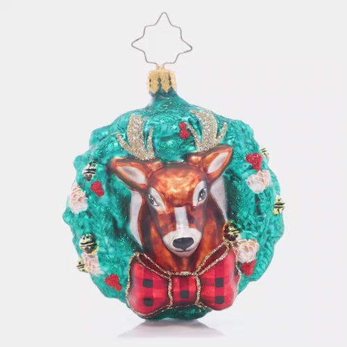 Video - Ornament Description - Rustic Reindeer Wreath Gem: That's one dashing reindeer! Dressed to the nines in a checkered bowtie, this splendid stag makes the perfect centerpiece in a vibrant green wreath. This video shows the ornament spinning slowly. 
