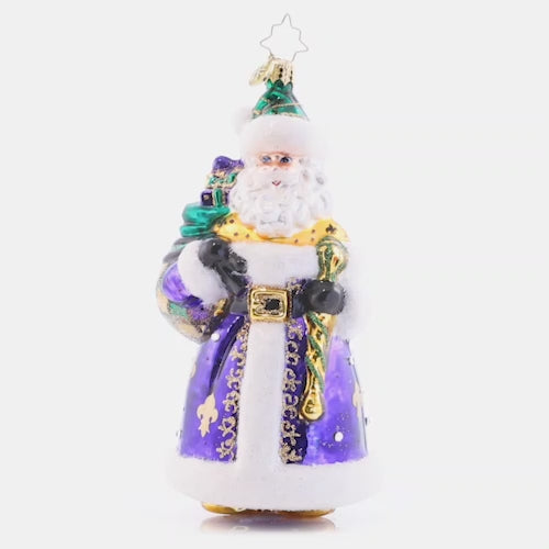 Video - Ornament Description - Lynn's Luxurious St. Nick: In a royal blue hue decorated with festive Fleur de Lis, this darling Santa is sure to bring luxurious style to your tree. Lynn Brammer gets the credit for this beautiful design! This video shows the ornament spinning slowly. 