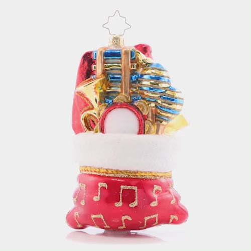 Video - Ornament Description - Band in a Bag: A whole Band in a Bag gives is full of wondorous talent for you to brag. This musical group is ready to play and celebrate a very special day!