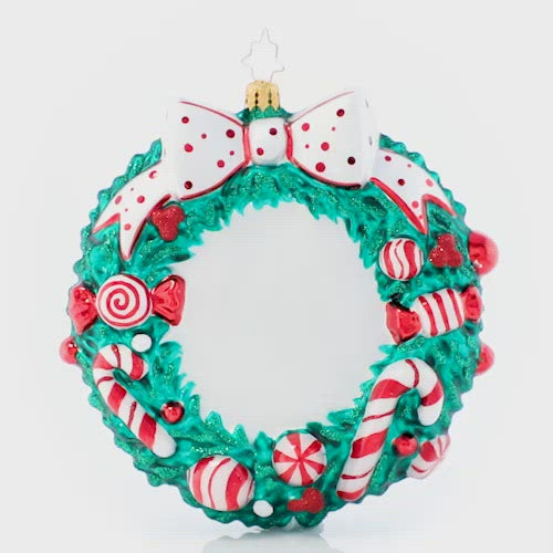Video - Ornament Description - Candy Cane Delight Personalized: A thoughtful, well-rounded holiday treat; a ring of warm wishes and peppermints so sweet! This commemorative wreath is the perfect way to celebrate the sweetest season of them all! Note: Please allow approximately one month (on top of shipping time) for our elves to personalize your ornament.