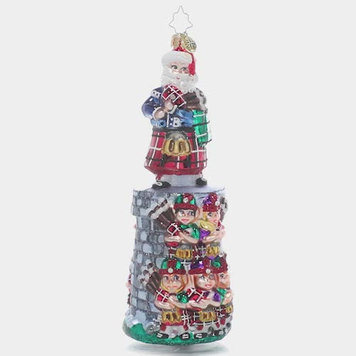Video - Ornament Description - Piper Posse: The penultimate addition to our Ornament of the Month series, this piece celebrates the 11th day of Christmas. You can practically hear the music coming from this team of tiny bagpipers led by their eleventh member and Christmas king himself, Santa Claus! This video shows the ornament slowly spinning.