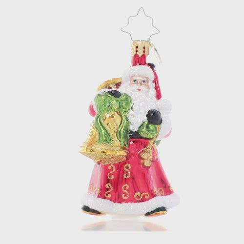 Video - Ornament Description - A Christmas Melody Gem: Can you hear the sounds of Christmas? With a sack of instruments slung over his shoulder and bells in hand, Santa has everything he needs to be his own one-man Christmas band!