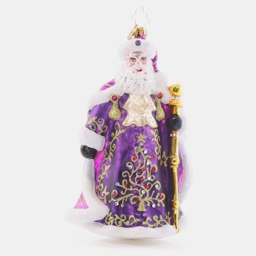 Video - Ornament Description - A Vision in Purple: Dressed head-to-toe in vibrant violet robes, this stunning Santa Claus brings an opulent elegance to your Christmas tree.