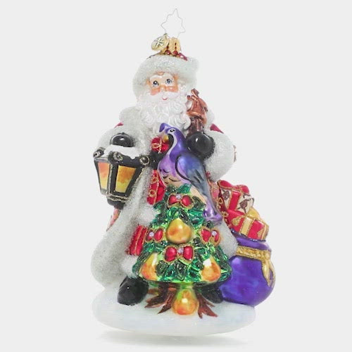 Video - Ornament Description - Santa's Pear Tree: The premier piece in our Ornament of the Month collection, this elegant ornament features a traditional Santa Claus presiding over a golden pear tree topped with a colorful partridge bird. This video shows the ornament spinning slowly. 