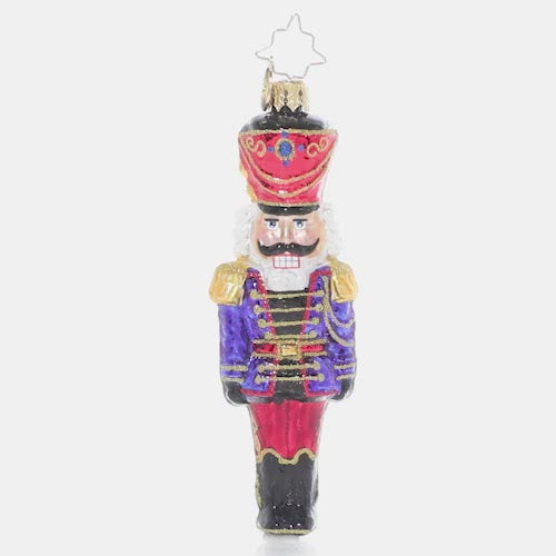 Video - Ornament Description - Classic Christmas Nutcracker: At ease, soldier! A classic mustachioed nutcracker looks smart in his Christmas uniform, ready to keep watch over your tree.