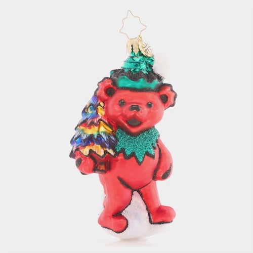 Video - Ornament Description - Grateful Dead Technicolor Tree Dancing Bear: This Dancing Bear set out to discover the wonders of nature, and just what did he find? One tie-dyed tree in a forest of plain pines! Wait till his bear buddies get a load of this: more proof that holiday magic exists. This photo shows the ornament spinning slowly. 