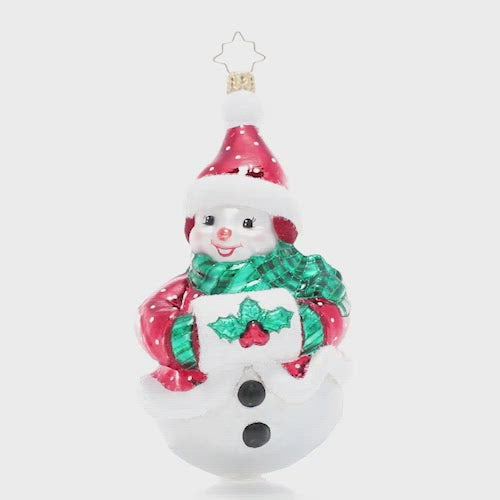 Video - Ornament Description - Holly Jolly Snowman: 'Tis the season to smile and this cheerful snow friend is very happy to see you! He's bundled up against the frosty air in some festive furs and a holly muff. This video shows the ornament slowly spinning.
