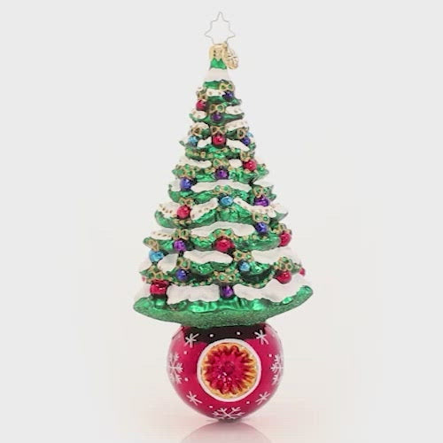 Video - Ornament Description - A Beautifully Balanced Tree: We are pine-ing for Christmas! A frosted fir sits perfectly perched atop a resplendent ruby-red holiday bauble.