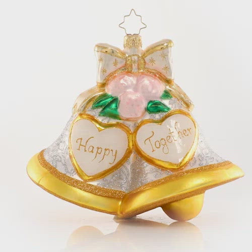 Video - Ornament Description - Forever Together: The merry chimes are pealing, soft and glad the music swells; gaily on the night wind stealing, sweetly sound the wedding bells. Hang this pair of wedding bells and celebrate love, both new and old! This video shows the ornament slowly spinning. 