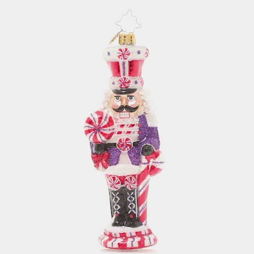 Video - Ornament Description - Candy Cane Cracker: How sweet it is! This peppy candy-cane themed nutcracker is ready to celebrate the holiday season in swirling red and white.