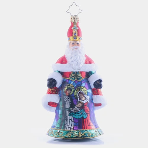 Video - Ornament Description - Sacred Scene Saint Nicolas: Saint Nicholas gave away all he had to follow in Jesus' footsteps of helping the poor and needy. This ornament represents the gift of Jesus given to us, so that we might be a gift to others. This video shows the ornament spinning slowly. 