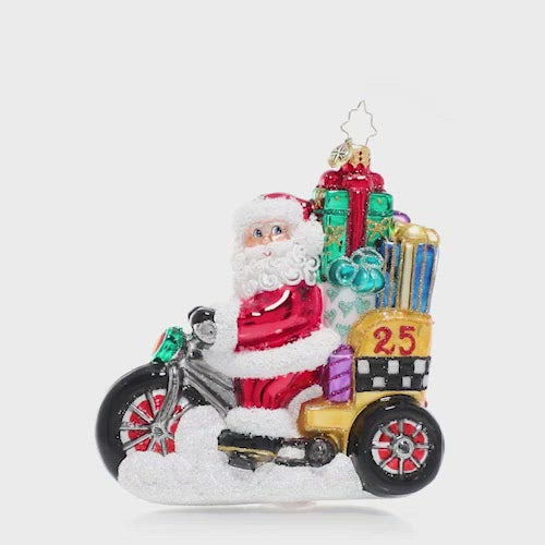 Video - Ornament Description - Pedal Pusher: Beep beep, coming through! Santa's taking to the streets on his pedicab piled high with all his Christmas deliveries. This video shows the ornament spinning slowly. 