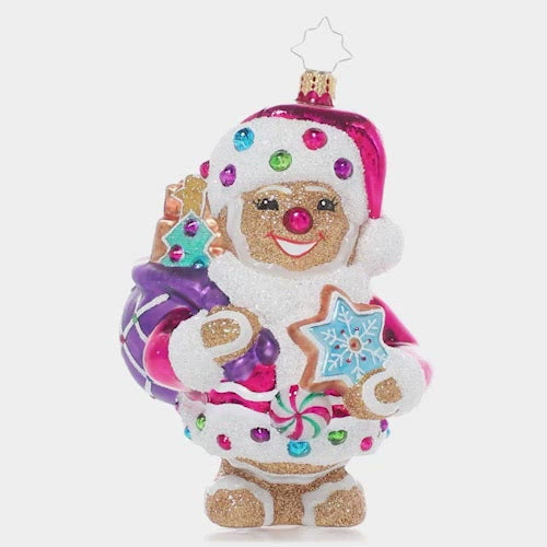 Video - Ornament Description - Gingersnap Santa: Gingerbread Santa is cute as a button! He's ready to make the holiday super sweet with his bag full of treats. This video shows the ornament slowly spinning. 