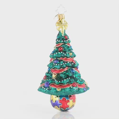 Video - Ornament Description - Puzzle Pieces Pine: Featuring the trademark autism puzzle piece symbol, this beautiful tree is unique and bright just like the special children it represents! A percentage of the sales from this ornament will benefit a charity that raises Autism awareness. This video shows the ornament spinning slowly. 