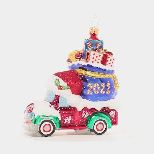 Video - Ornament Description - Happy Haul-idays: Looks like someone has been on the nice list this year! Stacked high with special gifts for loved ones, this cheery Christmas truck is looking ready for the season of giving. This video shows the ornament slowly spinning.