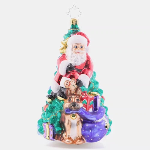 Video - Ornament Description - Santa's Best Friend - 2023: What better way to celebrate Christmas than with your best furry friend? Santa and Fido gather 'round the tree, ready to open presents and enjoy a cheerful holiday. This video shows the ornament spinning slowly. 