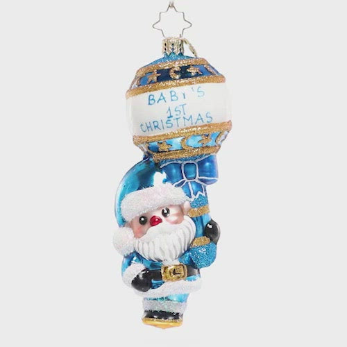 Video - Ornament Description - First Christmas Rattle: Baby Blue: It's a boy! Commemorate baby's first Christmas with this sweet Santa keepsake.