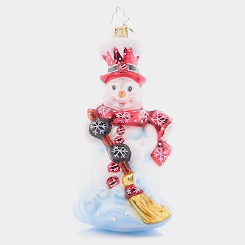 Video - Ornament Description - Snowswept: This snowmen has a job that's neat, tidying up every snowed over street. He'll work hard to make sure your yard is as picturesque as a scenic postcard. This video shows the ornament spinning slowly. 