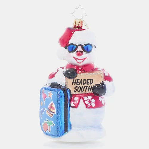 Video - Ornament Description - Out of Office Snowman: This snowman is pretty cold already, but now he's ready to chill! He's heading south to vacation in the sunny weather – hope he packed his SPF 10,000! This video shows the ornament spinning slowly. 
