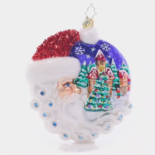 Video - Ornament Description - Christmas Village Santa: Looking out wistfully upon a cozy Christmas village, this crescent-moon Santa is the guardian of a holy night.