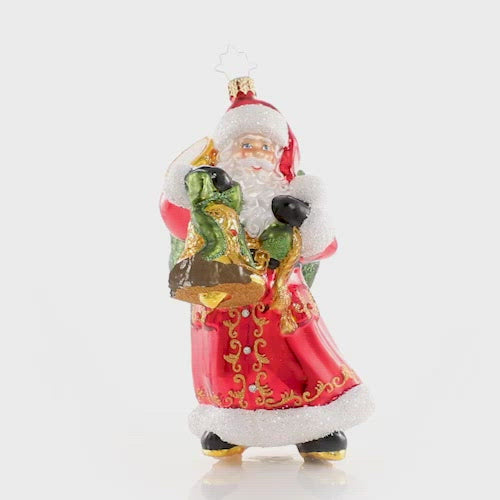 Video - Ornament Description - A Christmas Melody: Christmas bells are ringing! Santa knows that nothing brings people together quite like music, so he is spreading holiday cheer all through town with his collection of magical musical instruments. This special ornament has been hand-picked by the Radko team to be part of the Limited Edition collection.