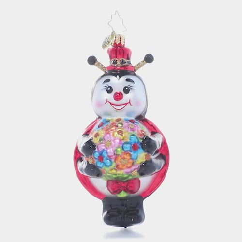 Video - Ornament Description - Who's The Lucky Ladybug?: Who doesn't love flowers? This cheerful ladybug gentleman smiles wide as he gathers a fresh spring bouquet for a very special someone. This video shows the ornament spinning slowly. 